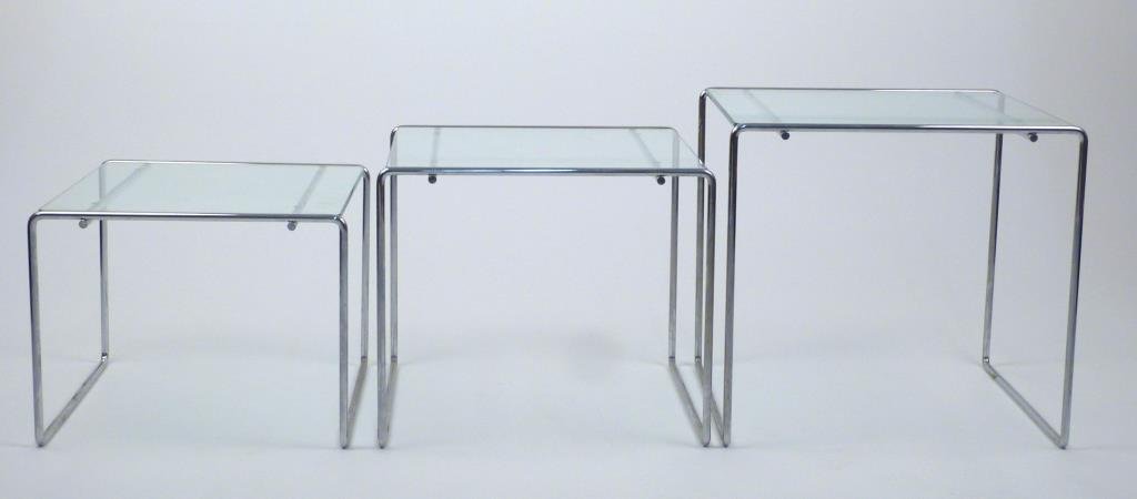 Set of 3 Bauhaus Style Nesting Tables: After Marcel Breuer, cantilevered chrome frames, glass tops. 18" W X 17" D X 17" H. (Prospect Park Brooklyn Property)