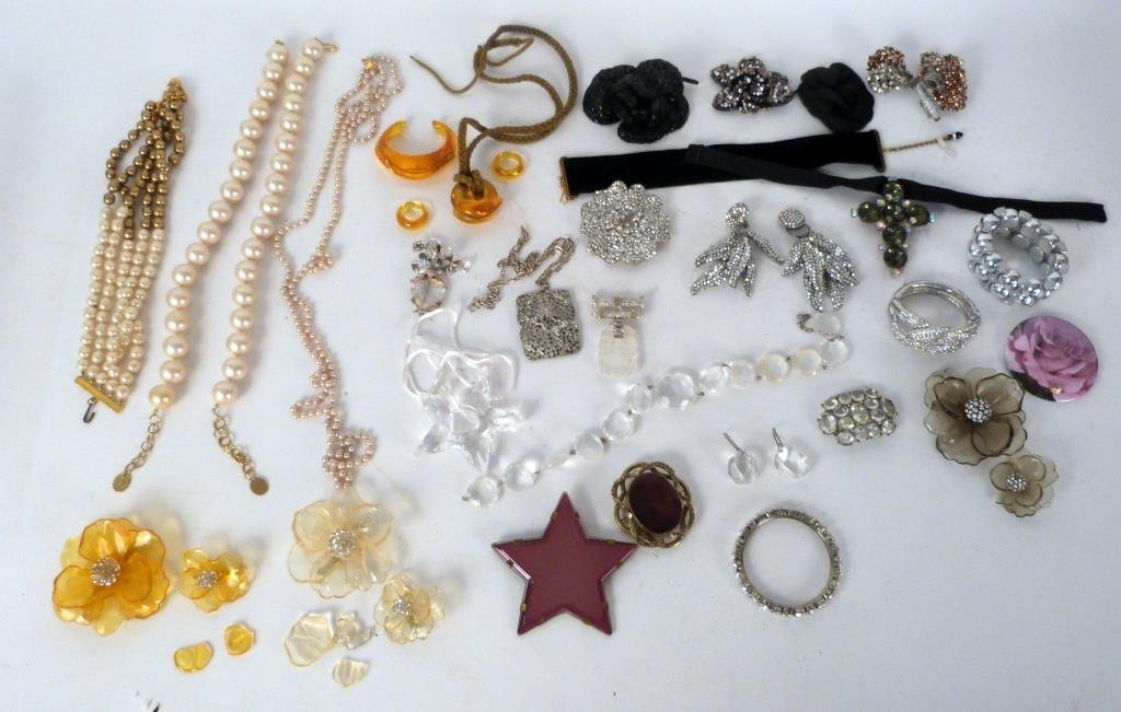 Assorted Flashy Costume Jewelry: Necklaces, earrings, bracelets, including faux pearls, resin, and glass; brands including Karl Lagerfeld, Sonia Rykie, Yves St Laurent, etc. Some pieces as is. (Madison Avenue NYC Estate)