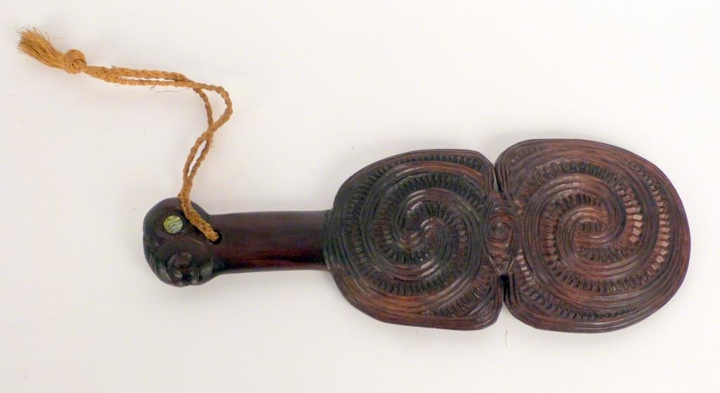 Maori Kotiate Paddle: Caved wood with swirl decoration, inlaid abalone eye. 13 1/2" L.