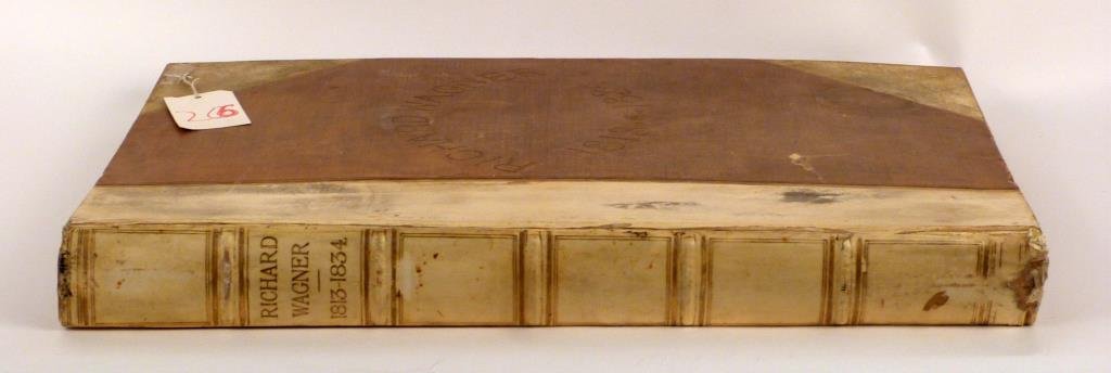 Large Richard Wagner Volume - Elephant Folio: Gilt bleached leather binding, as is. Engravings by Allan Wyan, bound by Birdsall Northhampton. Engraved for the Honorable Mrs. Burrell edition 82/100. 28" H X 22" W. As is.(Brooklyn Heights Estate)