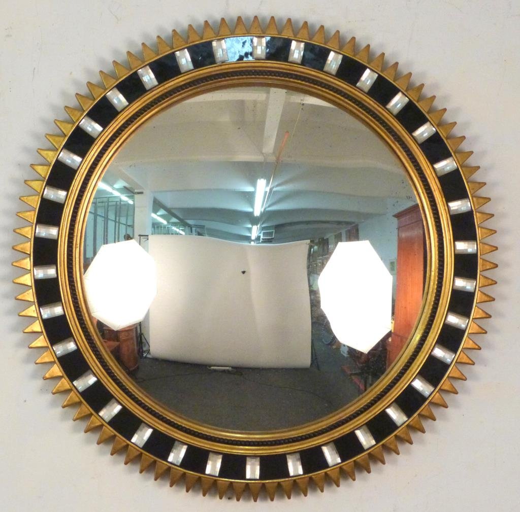 Round Art Deco Style Mirror: Gilt carved wood, black glass trim with applied cut glass mounts, convex mirror. 28 1/2"