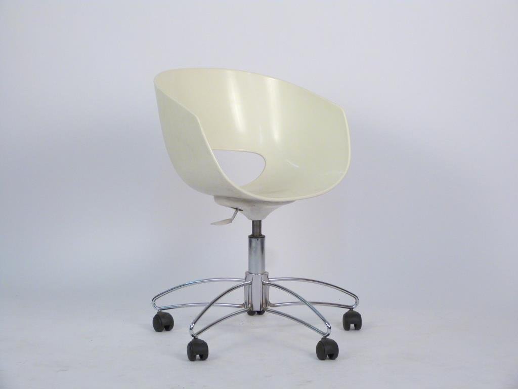 Ron Arad Style Task Chair: Fiberglass shell with cut out lower back, on 5 star chrome base, with casters. 26" W X 18" D X 30 1/2" H.