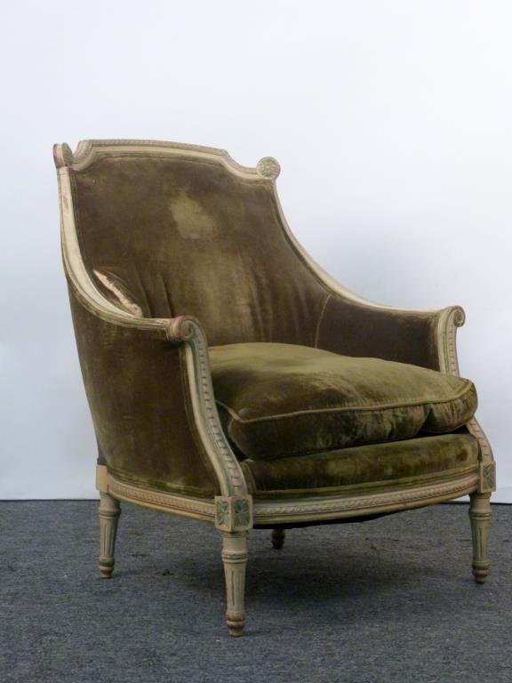 Louis XVI Style Bergere: Painted carved wood frame, fluted legs, upholstered. 30" W X 24" D X 37" H.