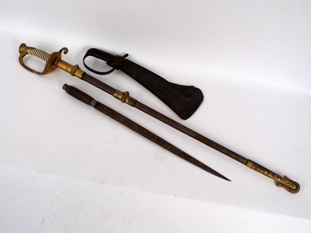 US Naval Sword in Metal Sheath and ++: US Naval etched sword in metal sheath (no leather), AND a Woodman Pal small hatchet in metal holder (handle marked private sale) and an old blade with wood handle. (sheath and handle 39" long)