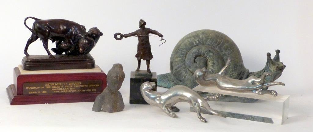 6 Assorted Bronze & Metal Statues: Including bronze bull and bear, bronze fisherman, metal otters, metal snail, and metal bust. Snail: 13" W X 6 1/2" H.