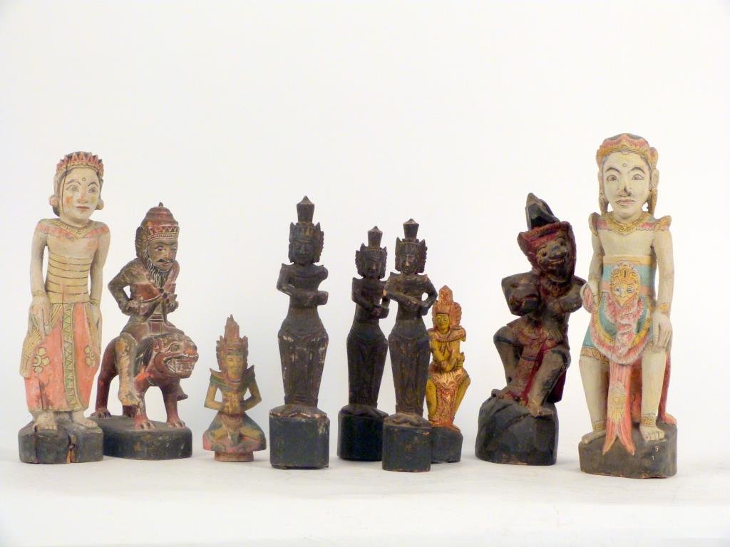 9 Indonesian Carved & Painted Wood Status: All figurative. Largest: 14" H.