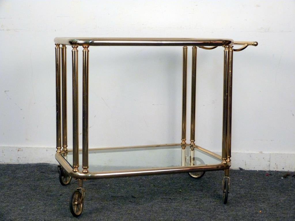 Mid-Century Brass Plated Tea/Bar Cart: 2 tiers with inset glass, double post supports, on casters. 32 1/2" W X 21" D X 28" H.
