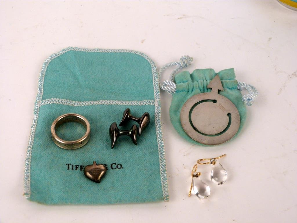 Assorted Tiffany Sterling Silver Articles: Including gold mounted earrings and sterling cuff links, both marked Peretti, together with ring, money clip, and heart charm.