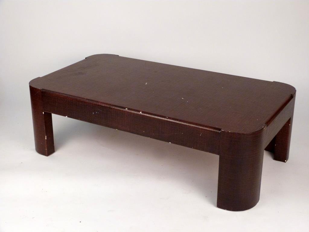 Karl Springer Style Cocktail Table: Protruding, rounded corners. 54" W X 30" D X 16 1/2" H. Chips to finish.