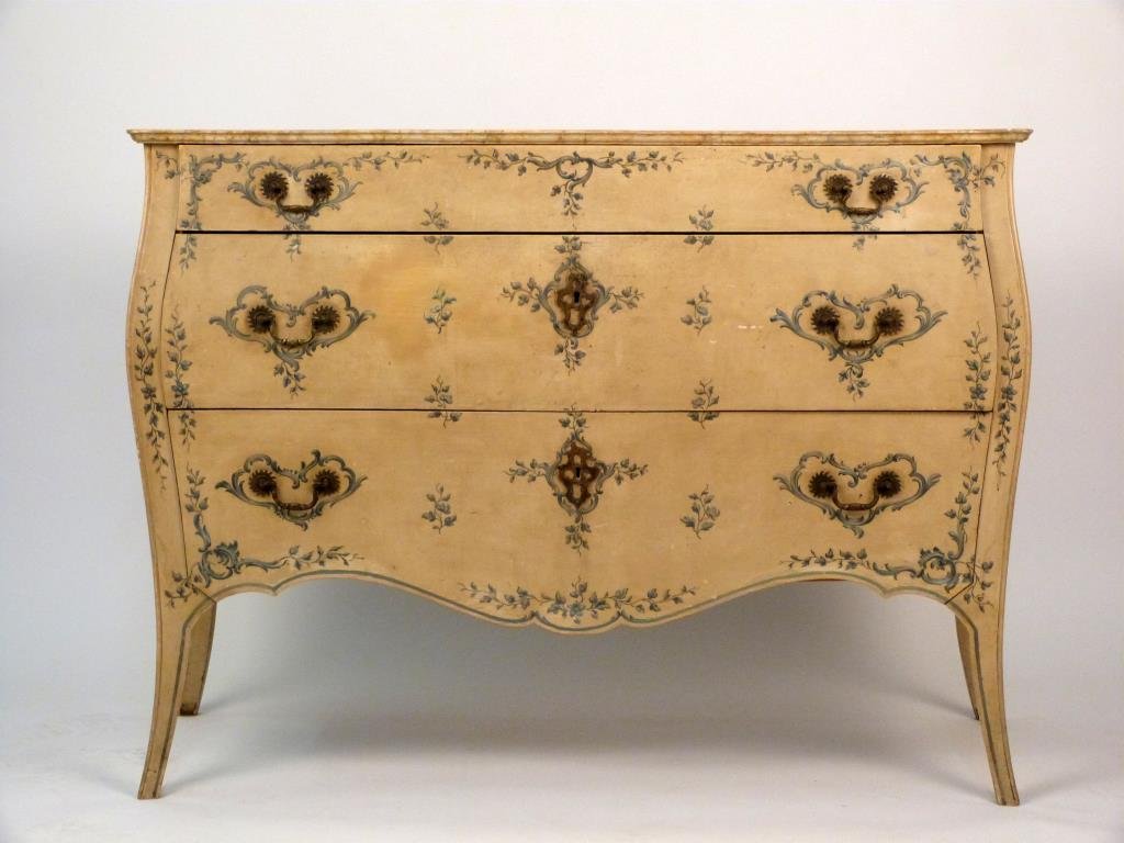 Venetian Style 3 Drawer Chest: Painted wood, creme ground, with blue floral spray and scroll, slender tapered legs. 52" W X 21" D X 36" H. Missing marble top.