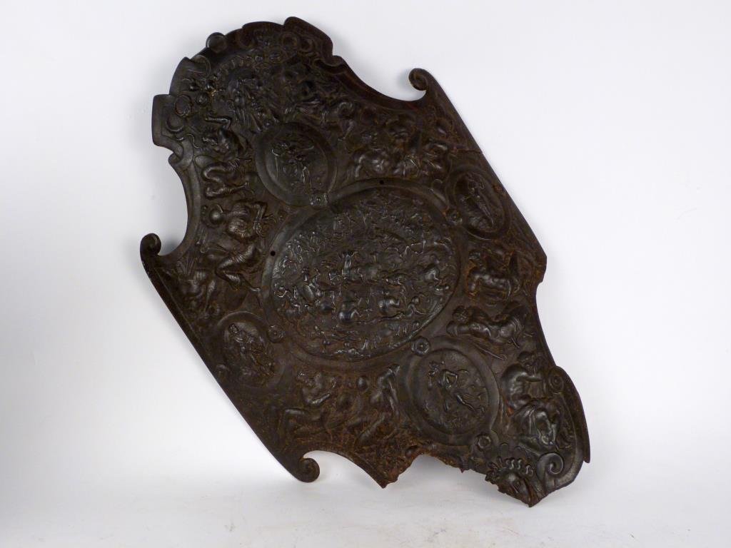 Antique Bronze Shield: Extensive decoration depicting figures, some on horseback and engaged in battle. 24 1/2" H. Losses and possible restoration.