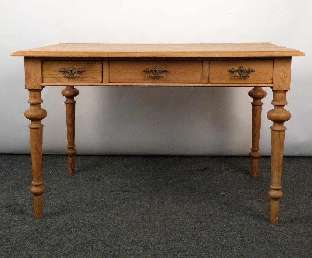 American Pine Partner's Desk / Library Table: 6 drawers, turned wood legs, 3 drawers on each side. 48" W X 34" D X 29 1/2" H. (575 Park Avenue Property)