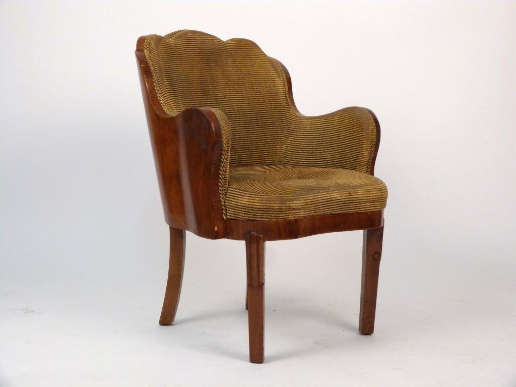 Art Deco Arm Chair: Sculpted maple veneer shell, upholstered seat. 24 1/2" W X 25" D X 33 1/2" H. As is.