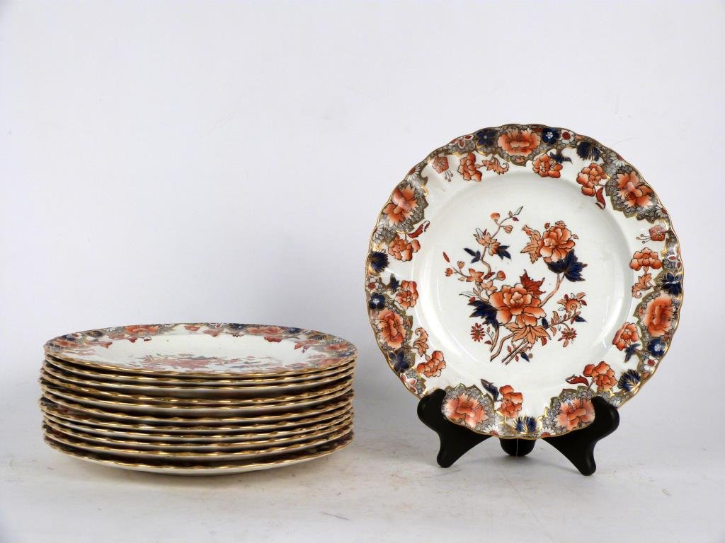 12 English Imari Pattern Plates: Some marked Copeland Late Spode, ironstone, with floral and gilt decoration. 10" D. 1 with large chip, 1with hairline crack.