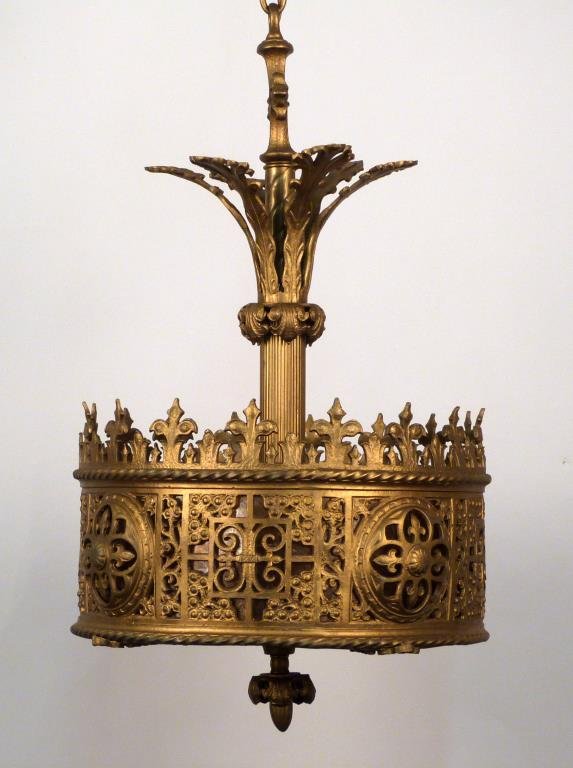Gothic Style Gilt Metal Chandelier: Open metal work with amber mica lining, fleur de lis and acanthus leaf design. 22" H. X 131/2" D.