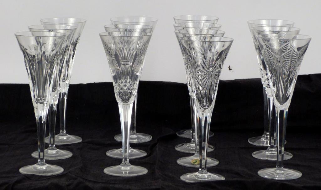 13 Waterford Champagne Flutes: Assorted patterns. (320 Central Park West Estate)