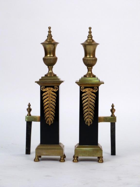 Pair of Empire Style Andirons: Mixed metal, urn finials and acanthus leaf mounts. 7 1/2" W X 8" D X 21" H. (From an East Side Townhouse)