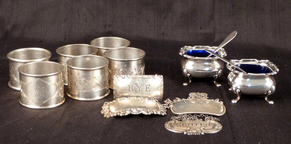 Assorted English Silver Articles: Napkin rings monogrammed J.C. (5 being marked Levi & Salaman, Birmingham 1913), 4 bottle labels, 2 open salts (Birmingham Modern).