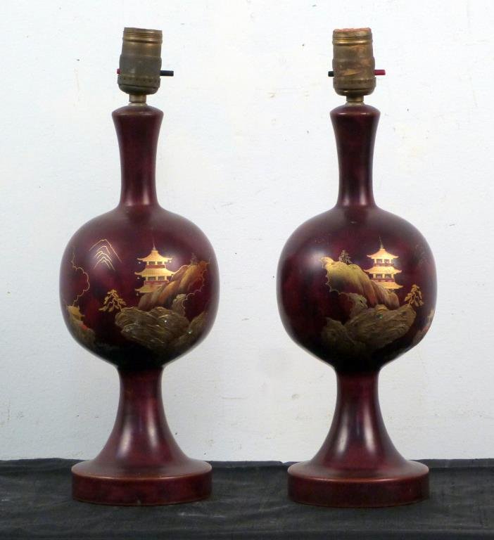Pair of Chinoiserie Table Lamps: Enameled metal with flared neck, bulbous mid-section and flared foot, pagoda painted decoration with applied abalone. 15 H.
