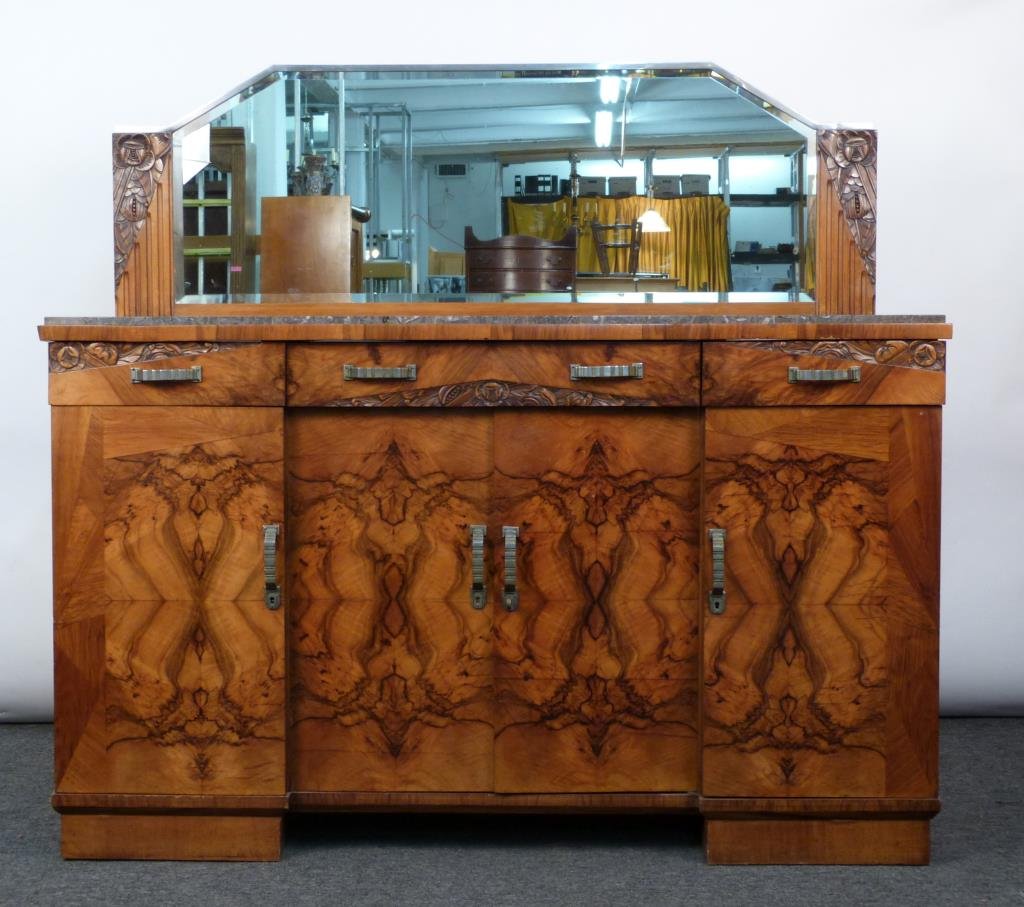 Art Deco Sideboard & Mirror: Burled and carved walnut with marble top, 3 drawers over double door cabinet flanked by single door cabinets, all opening to shelves; together with a matching wall mounted beveled mirror. 67 1/2 W X 2