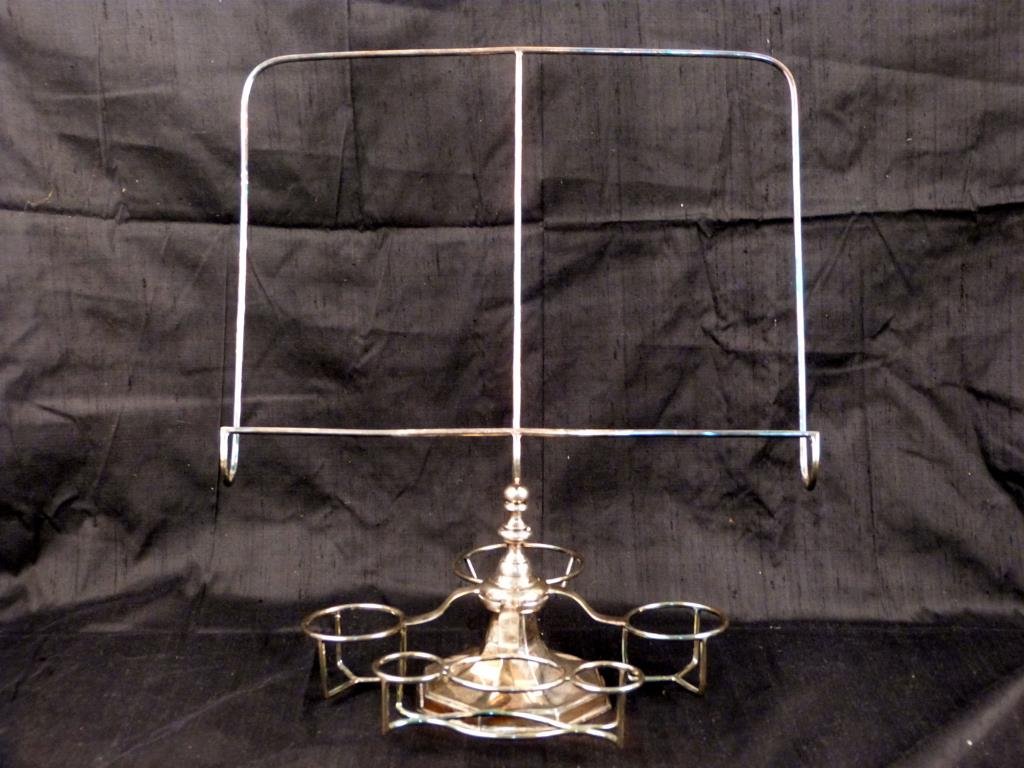 Asprey of London Serving Stand: Revolving base, silver plated. 15 W X 10" D X 16" H."