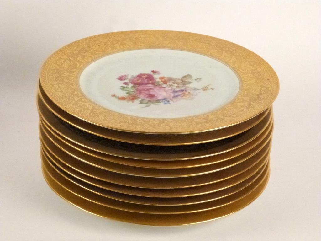 10 Bavarian Porcelain Dinner Plates: Assorted hand painted decoration, gilt rims. 10 3/4 D. No chips, cracks, or hairlines. (From an East 79th Street Estate)"