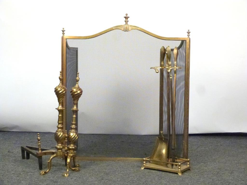 Assembled Brass Fire Place Ensemble: Screen, andirons, and fire tools set with horse head finial. Screen: 30 1/2 W (center panel only) X 26" H. (From an East 79th Street Estate)"