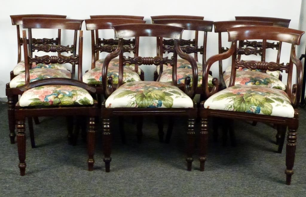 Set of 11 Antique Regency Style Dining Chairs: Carved splat backs, slip seats. Some having or in need of restoration. Arm chair 22 W X 24"D X 34'H (side chair slightly thinner.) (Property of a Mamaroneck NY Private Collector)"