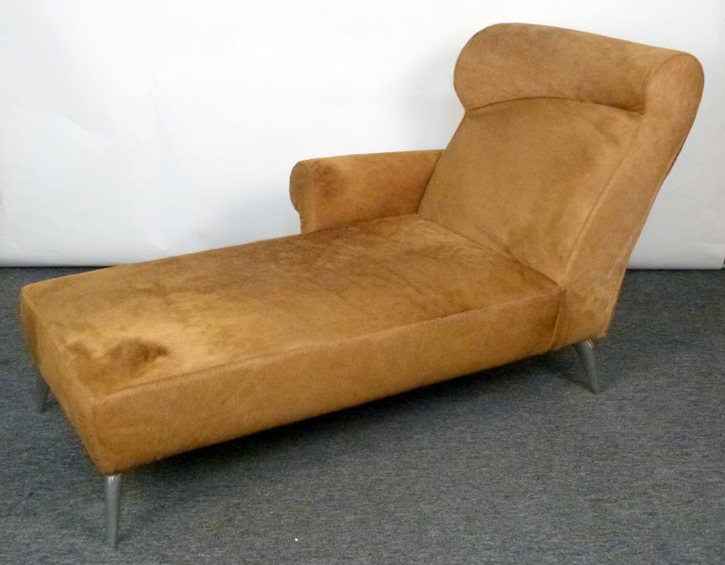 Contemporary Chaise Lounge: Asymmetrical rolled back, 1 rolled arm, animal skin (horse?) slip cover upholstery, polished aluminum legs. 66 W X 36" D X 36" H."