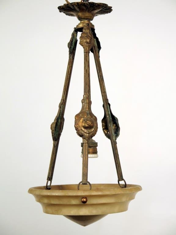 Art Deco Alabaster Pendant Chandelier: Stepped alabaster dome with pointed center, supported by 3 gilt fluted metal rods with applied mounts. 19" H X 10" D. Small loss at natural fault.