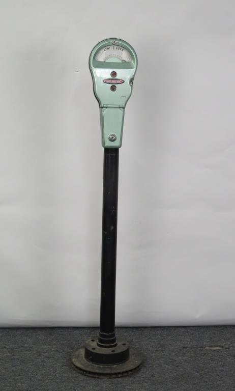 Coin Operated Park-O-Meter: Enameled and ebonized metal. 52.5 H."