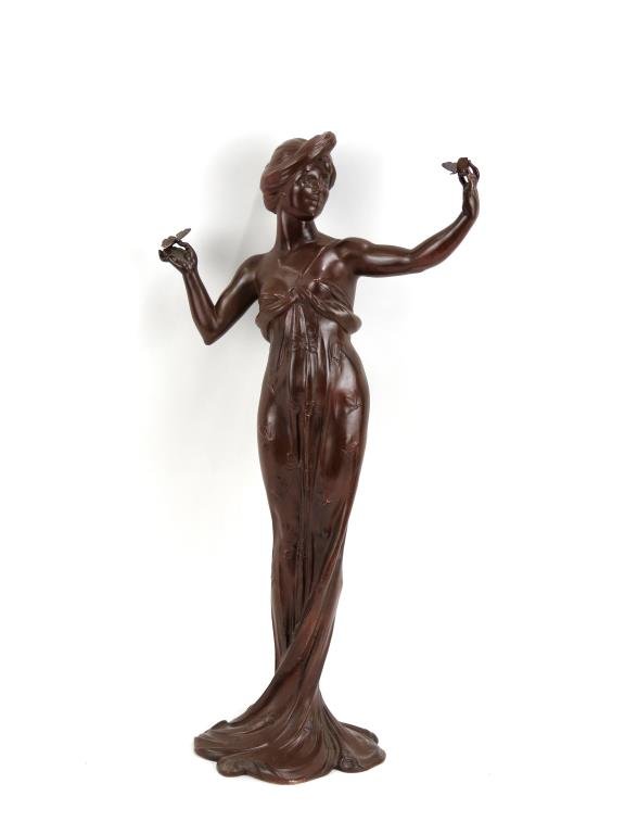After Claude Bonnefond- Art Nouveau Figure: Standing figure of a woman in a flowing gown with butterflies and dragonflies, butterflies perched on her extended arms, signature inscribed. 23.75 H. (Estate of Dr. Daniel Lovette, Camp Hill, PA)