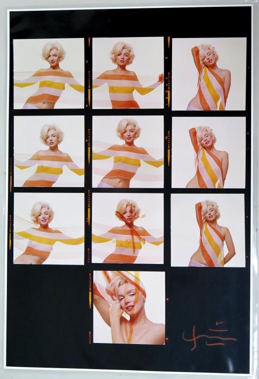 Bert Stern (American, 1929-2013)- Photograph: Marilyn Monroe gleefully posing with a sheer scarf, signed lower right and stamped on reverse, Photo on paper. 19" H X 13" W.