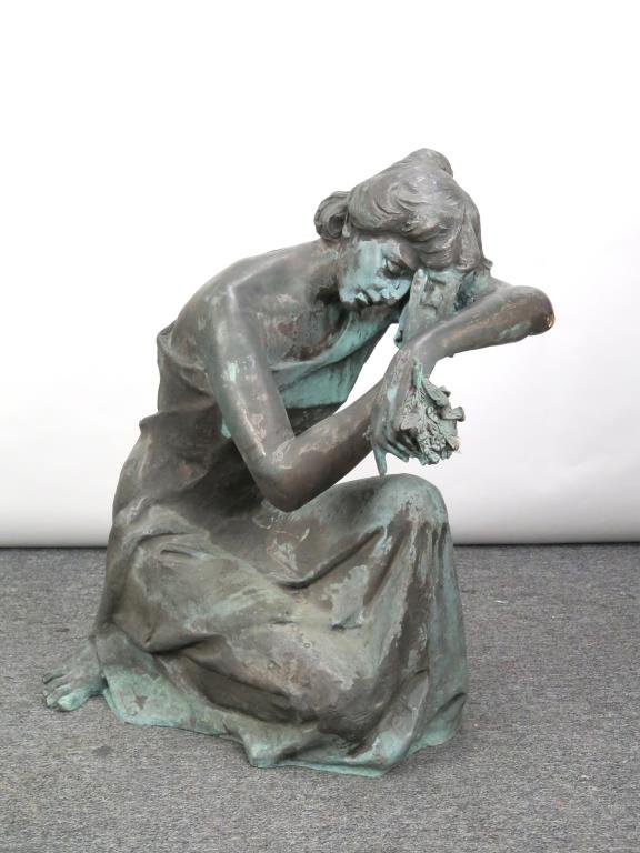Chirico Bronze Sculpture of a Mourner: Signed Chirico, Italian style kneeling woman in flowing robes with head in arm and clasping flowers. 35.5 H X 32" W X 23.5" D. This sculpture is free standing however it is made to be up against a led