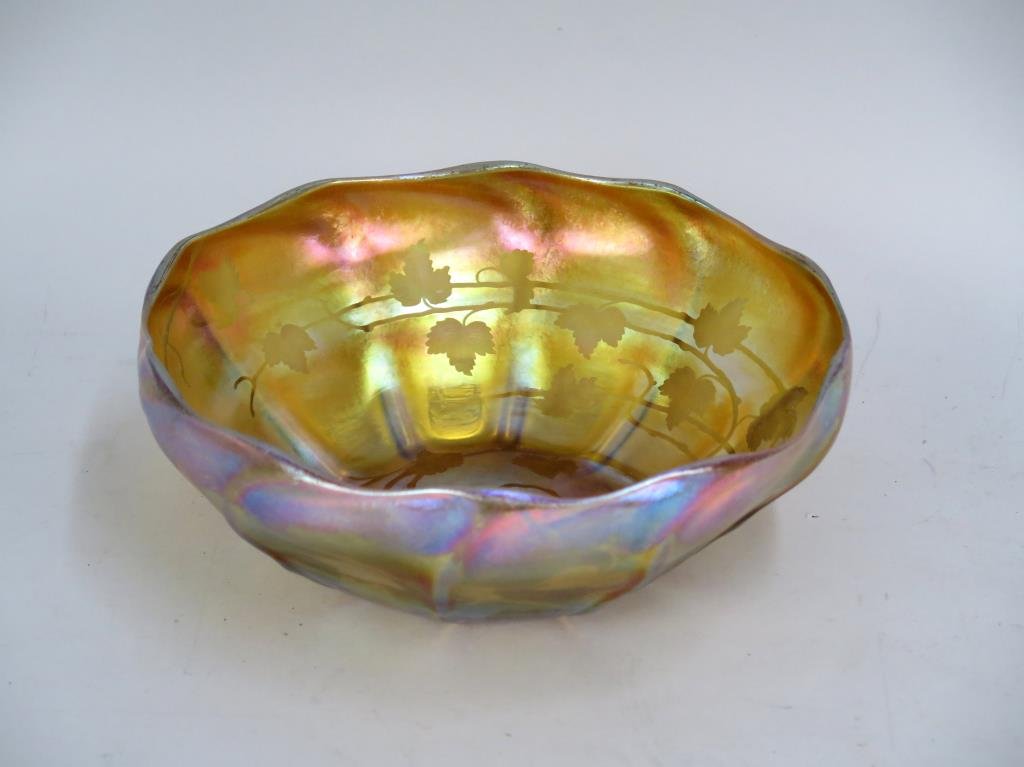 Tiffany Favrille Glass Bowl: Tiffany Favrille Glass Bowl Ruffled edges with interior etched vine design. Signed on base LC Tiffany Favrille. 10Dia. X 4"H"