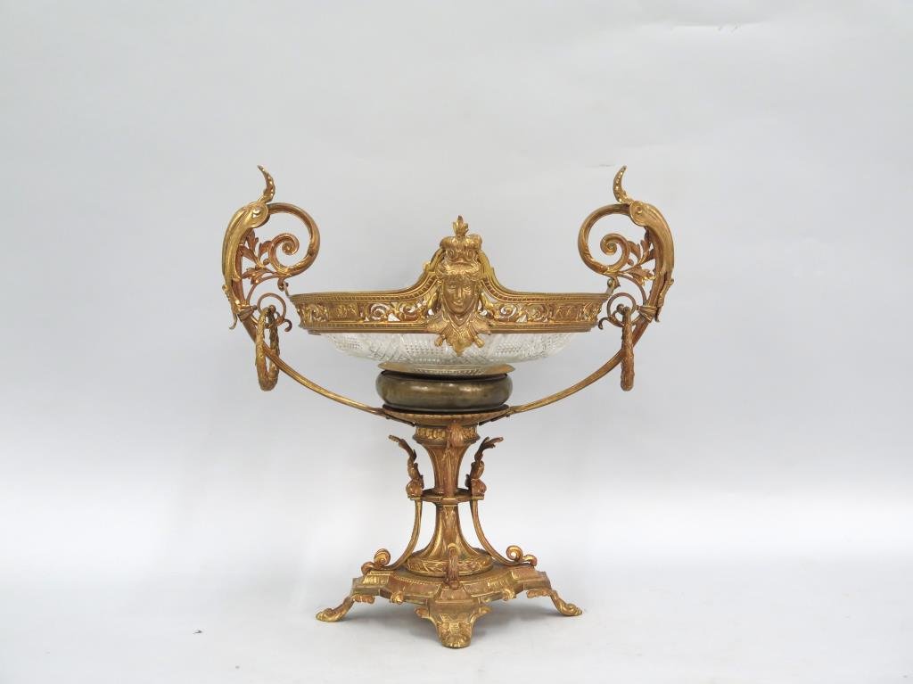 Gilt Bronze and Cut Glass Centerpiece (As Is): Gilt Bronze and Cut Glass Centerpiece (As Is) With pierced gallery, floral and figural designs, on four foot base. Glass bowl secured by brass decoration in center. Gallery very loose. Chip and crack 