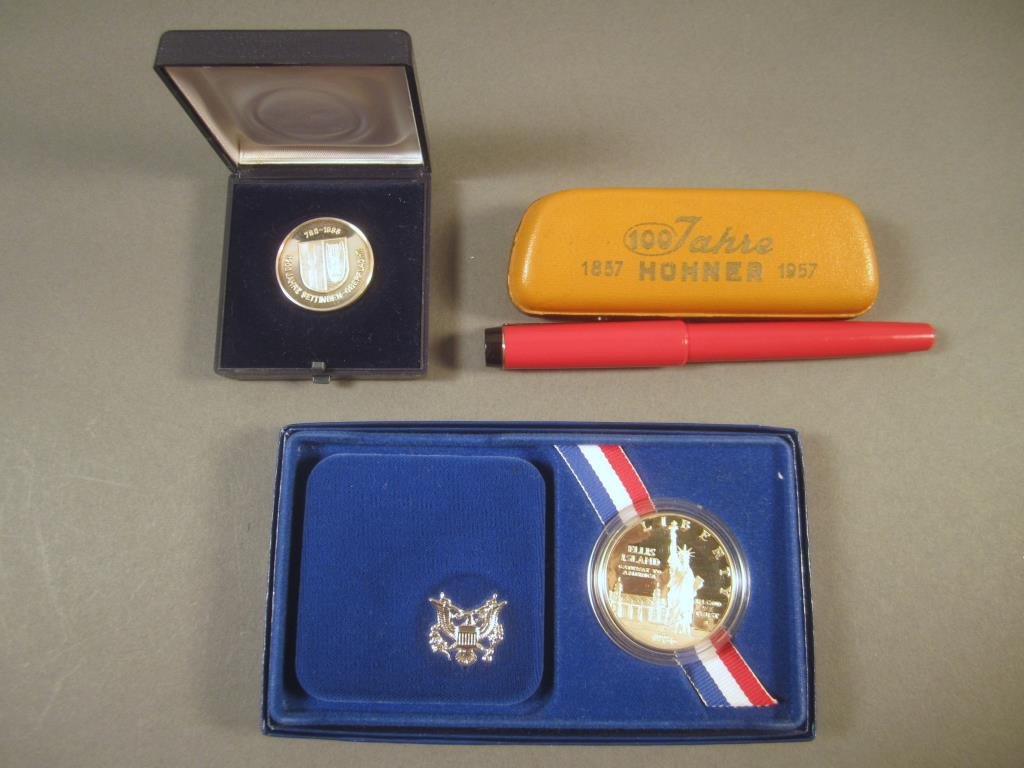 2 Boxed Coins and a Hohner Harmonica (1 of 4)