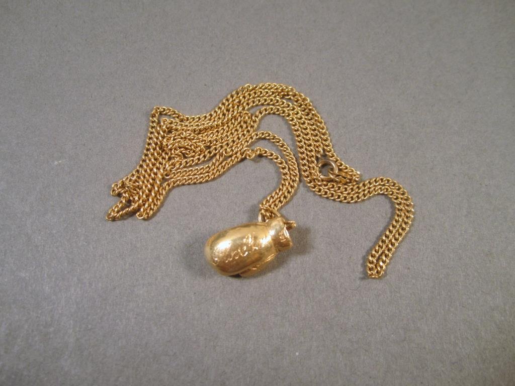 14K Gold Boxing Glove Pendant: on a gold filled chain. Glove inscribed "I Love You" (Glove 4+ g)