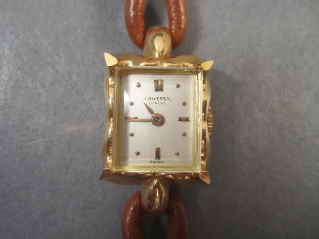 Universal Geneve Ladies Watch: Leather and gold plated band.