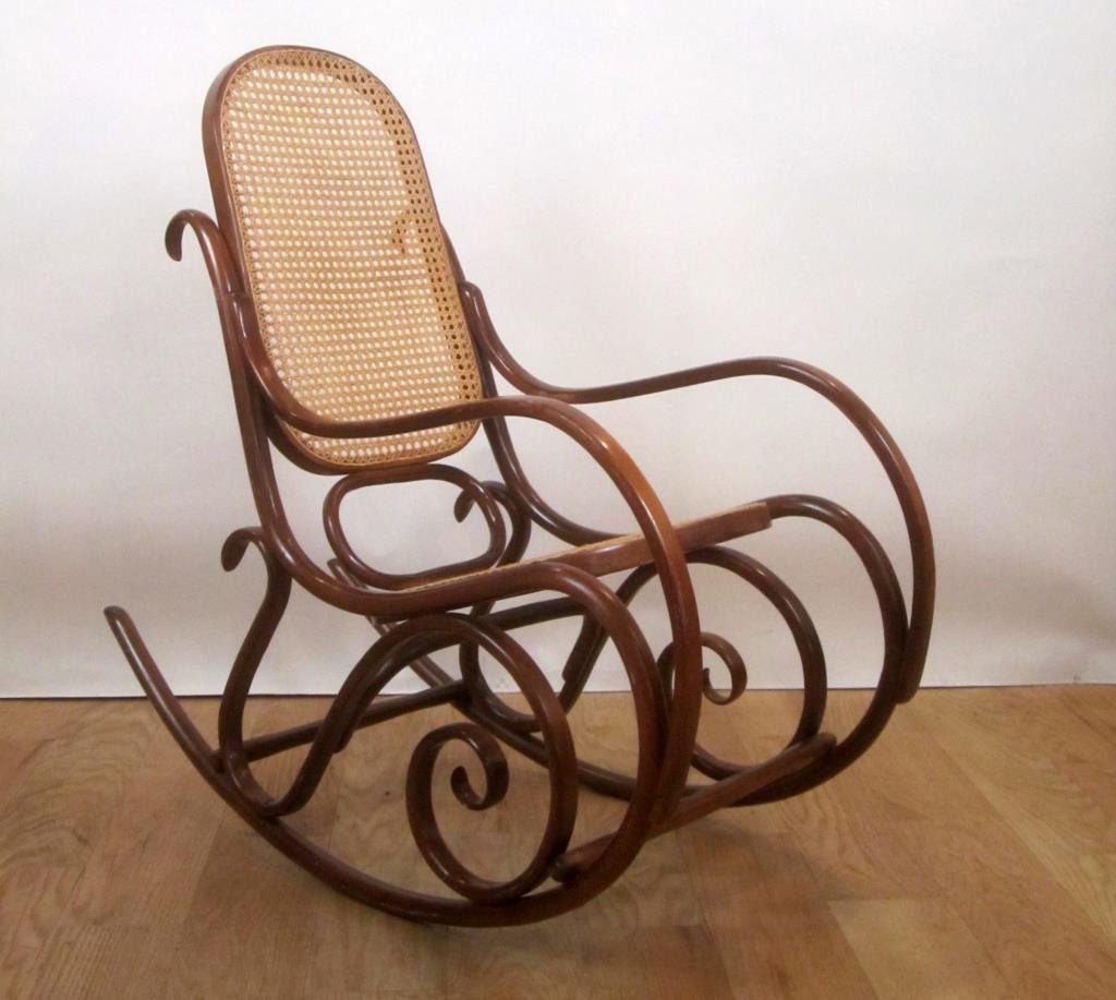Caned Bentwood Rocking Chair: With distinct, curved arms and base. 20W X 41"D X 41"H. (Riverside Drive Estate)"