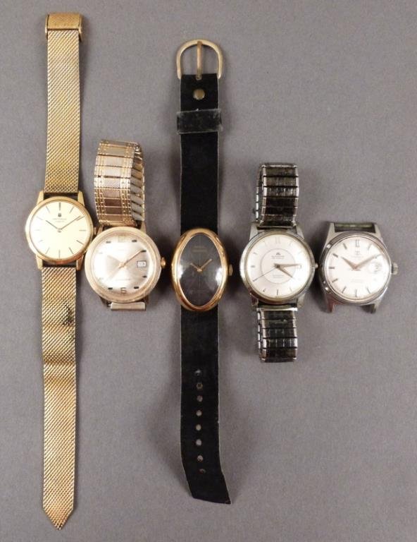 5 Men's Wrist Watches (as is): Universal Geneve, Timex, Marcel Boucher, Boucherer, and Tissot. No guarantees to authenticity. As is.