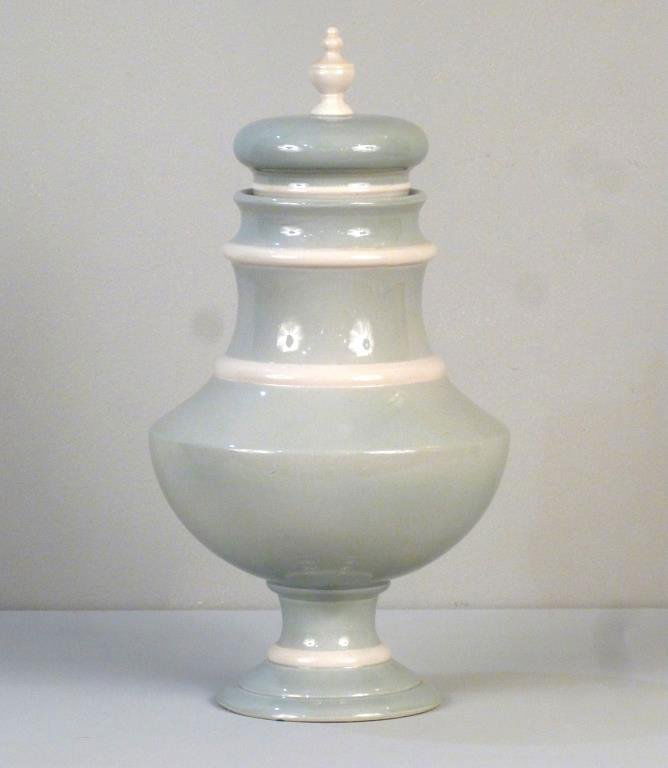 Porcelain Mancer Raymor Covered Vase: Light blue with white finial on lid and bands. 9.5Dia. X 17.5"H"