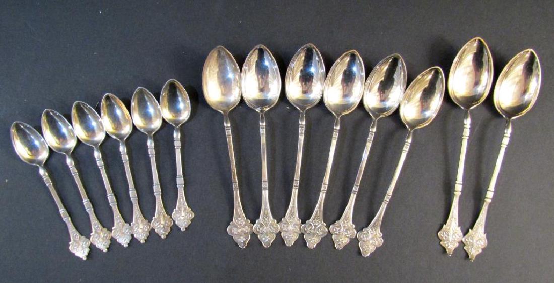 Suite of 14 Continental Silver Spoons (1 of 2)