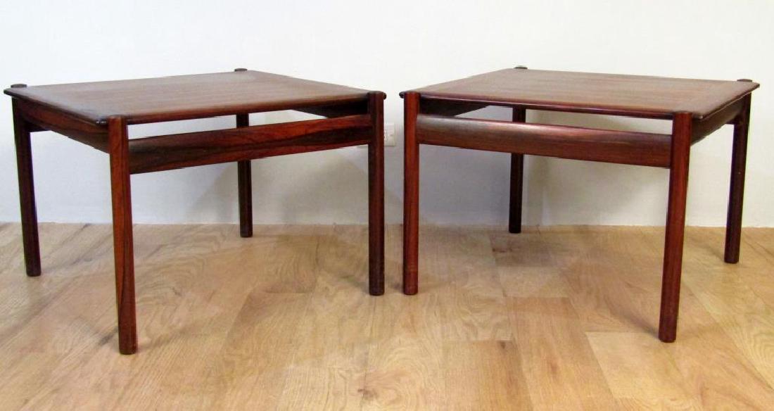 Pair Dokka Mobler Cocktail Tables: Rosewood with alternating open apron. Stains as shown. 27.5W X 26"D X 19"H"