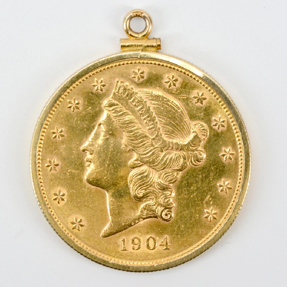 Twenty dollar gold liberty double eagle coin in bezel