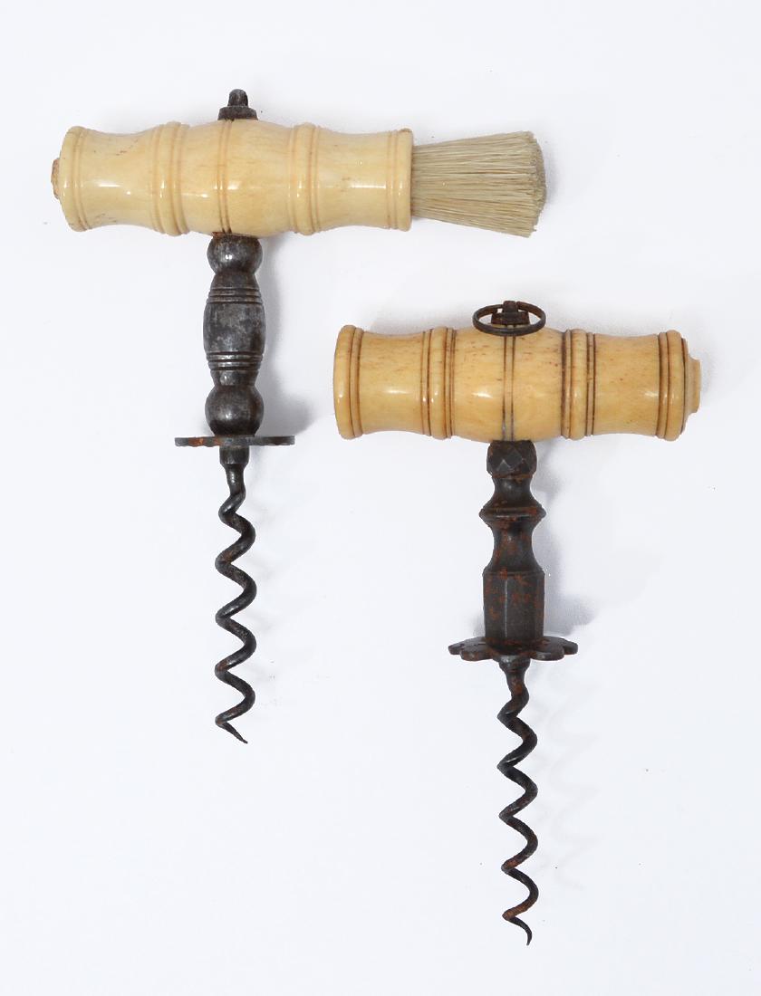 2 19th C English corkscrews: 2 19th C English corkscrews including one fine turned bone handle, faceted ring and turned hexagon base pillar. The other fine turned bone handle with brush, largest appx 5 3/4".