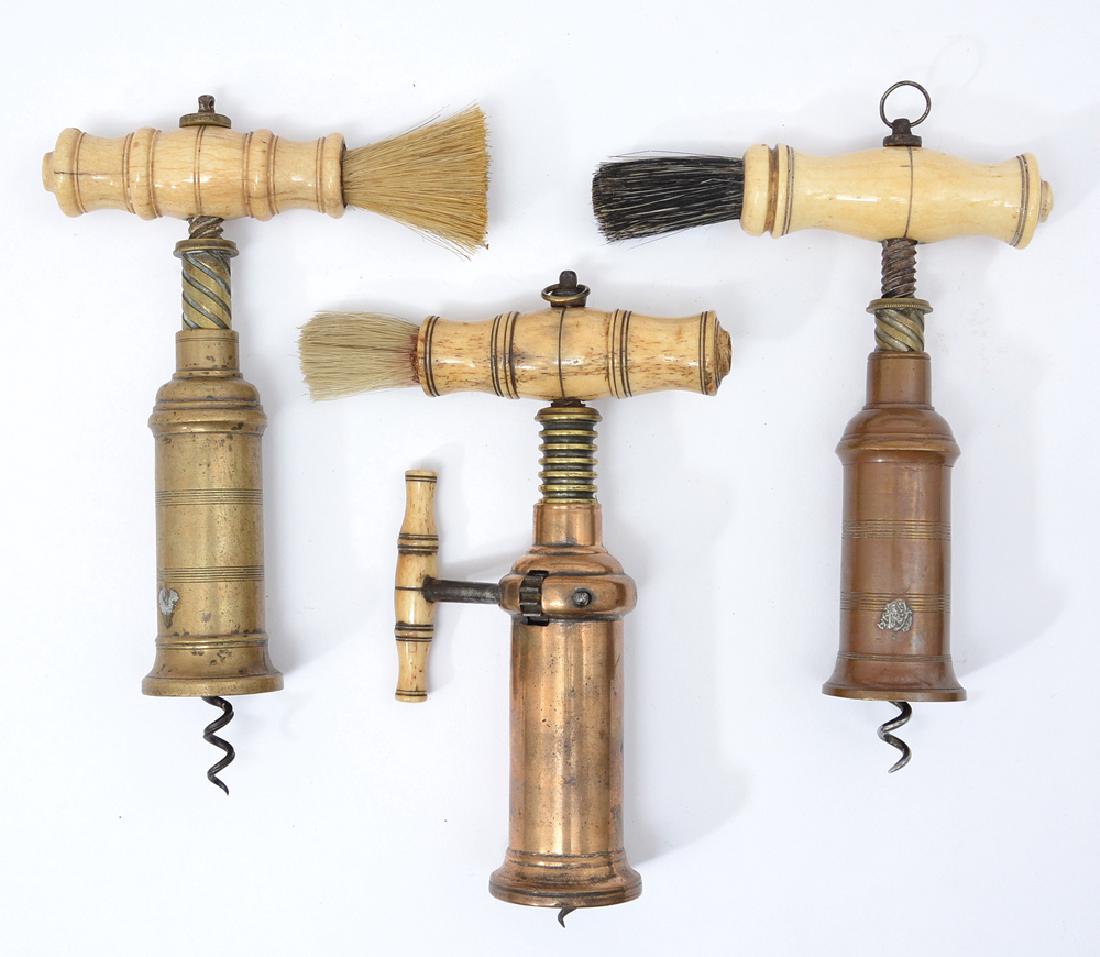 3 Thomason type corkscrews with bone handles: 3 Thomason type corkscrews all with bone handles and brushes, one with coat of arms and ratchet, largest appx 7".
