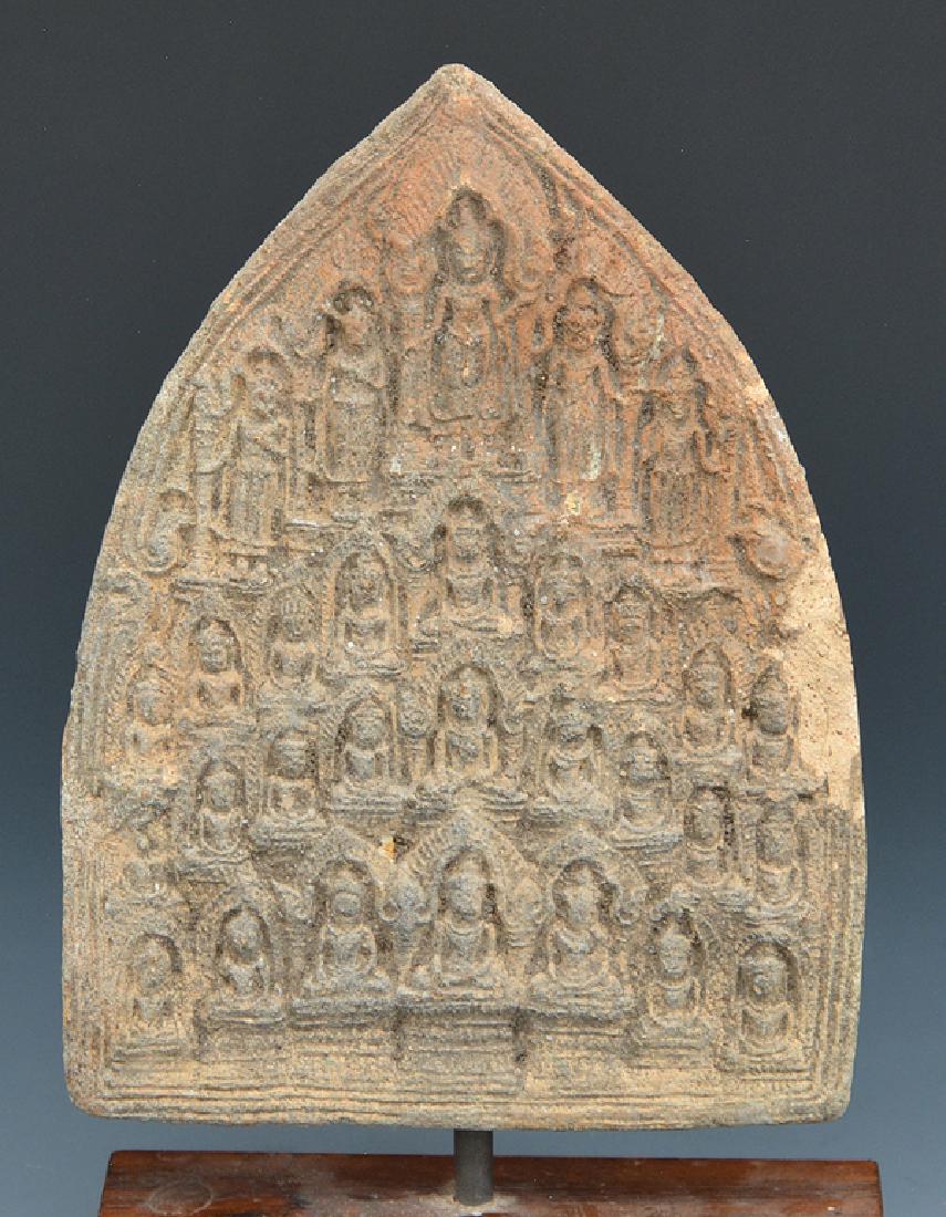 Asian carved stone architectural fragment (1 of 2)