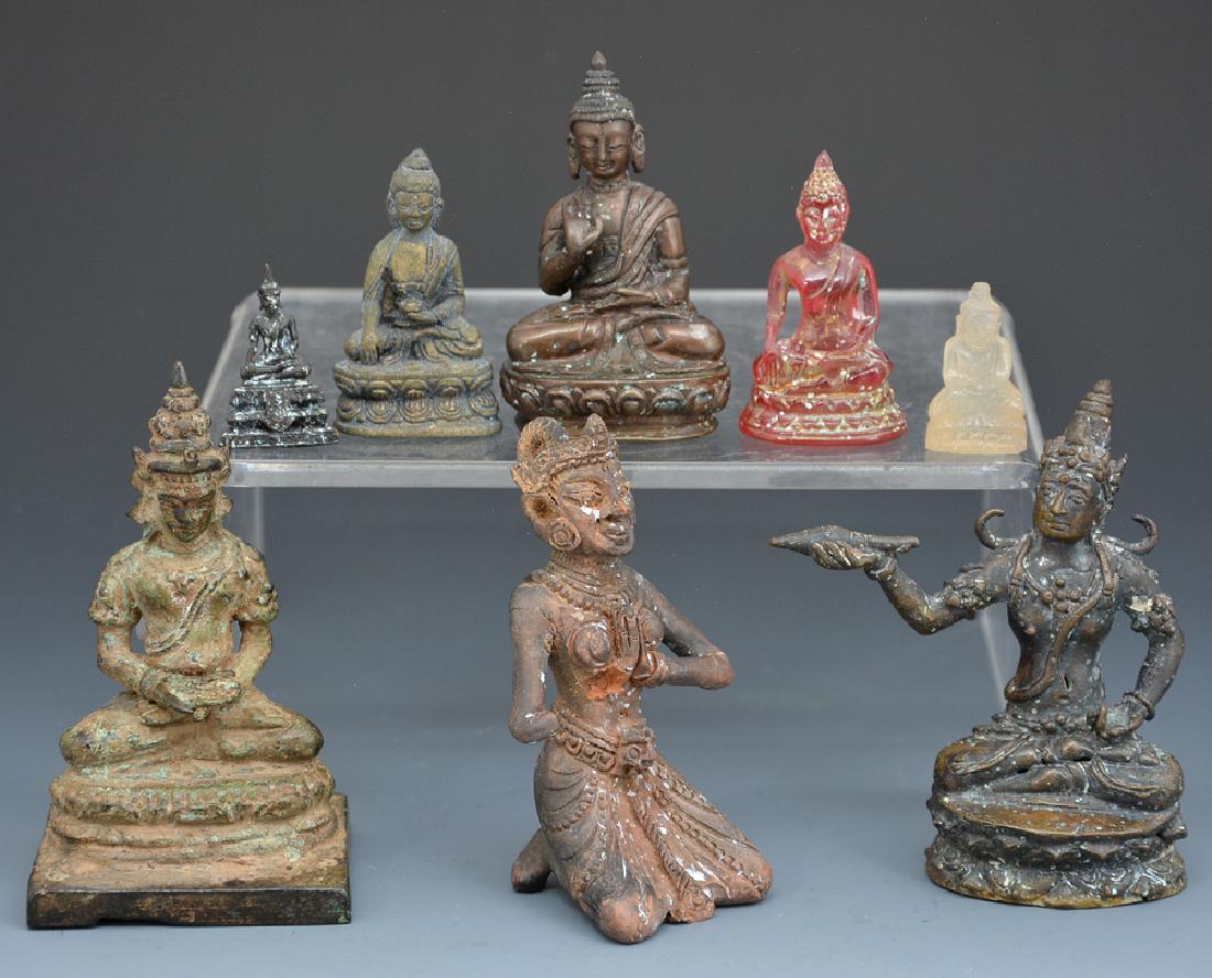 Group of 8 Asian carvings, Buddhist (1 of 3)