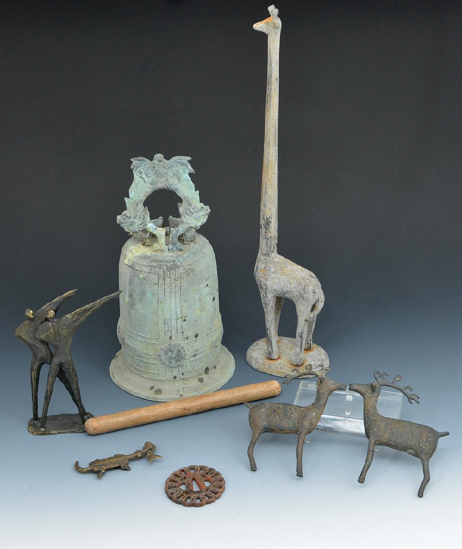 Group of metal decorative objects: Group of metal decorative objects, including bronze bell, bronze giraffe, sculpture of people, two deer, alligator and architectural element. Tallest appx 18".